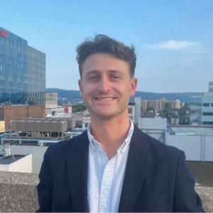 Trevor Tormann on a rooftop in the City of Allentown.